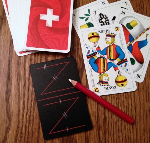 The best partnership games are of the "marriage group," so-called because pairing Kings-Queens of the same suit score points (Pinochle is the most common American version). Here a Jass board is used to keep score in Jass - the national card game of Switzerland, but with dozens of variations throughout the world.